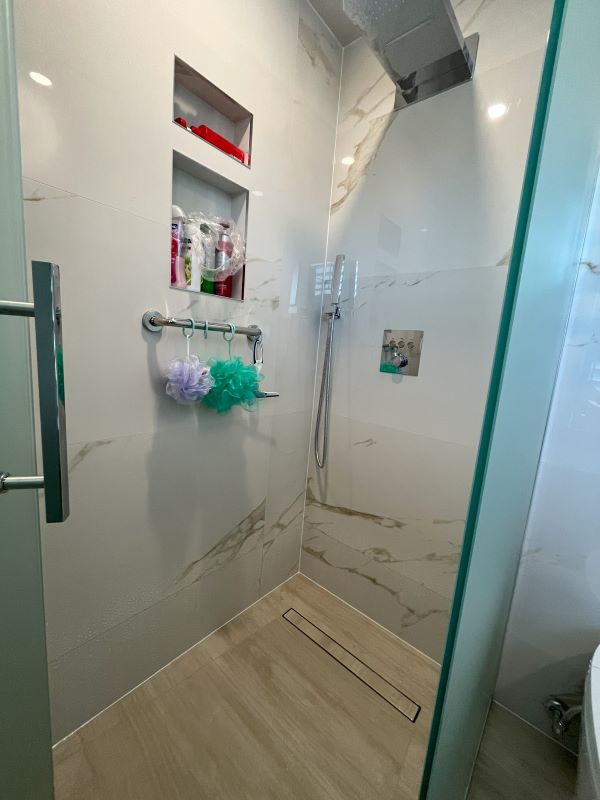 woodbridge small bathroom renovation insatallation curbless glass shower custom niche fly vanity smart toilet electric heated towel rail underfloor heating 8 Aurora