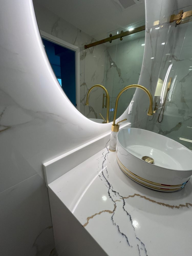 bathroom reno toronto gta with vanity huge round mirror and led lighting