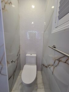 In the toilet area, we used white subway tile laid in a striking chevron pattern 1 Thornhill