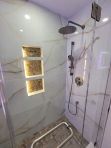 niche, complete with three shelves and soft, intimate lighting, provides both functional storage and a spa like ambiance 2 Thornhill