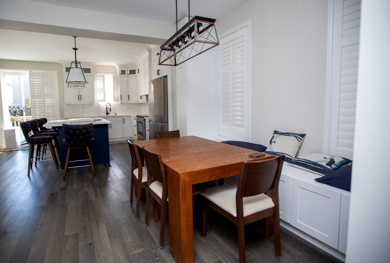 Finished kitchen with modern quartz and backsplash Toronto