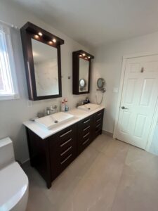 vanity by replacing the countertop with sleek quartz surface and installing two new recessed sinks and faucets Thornhill