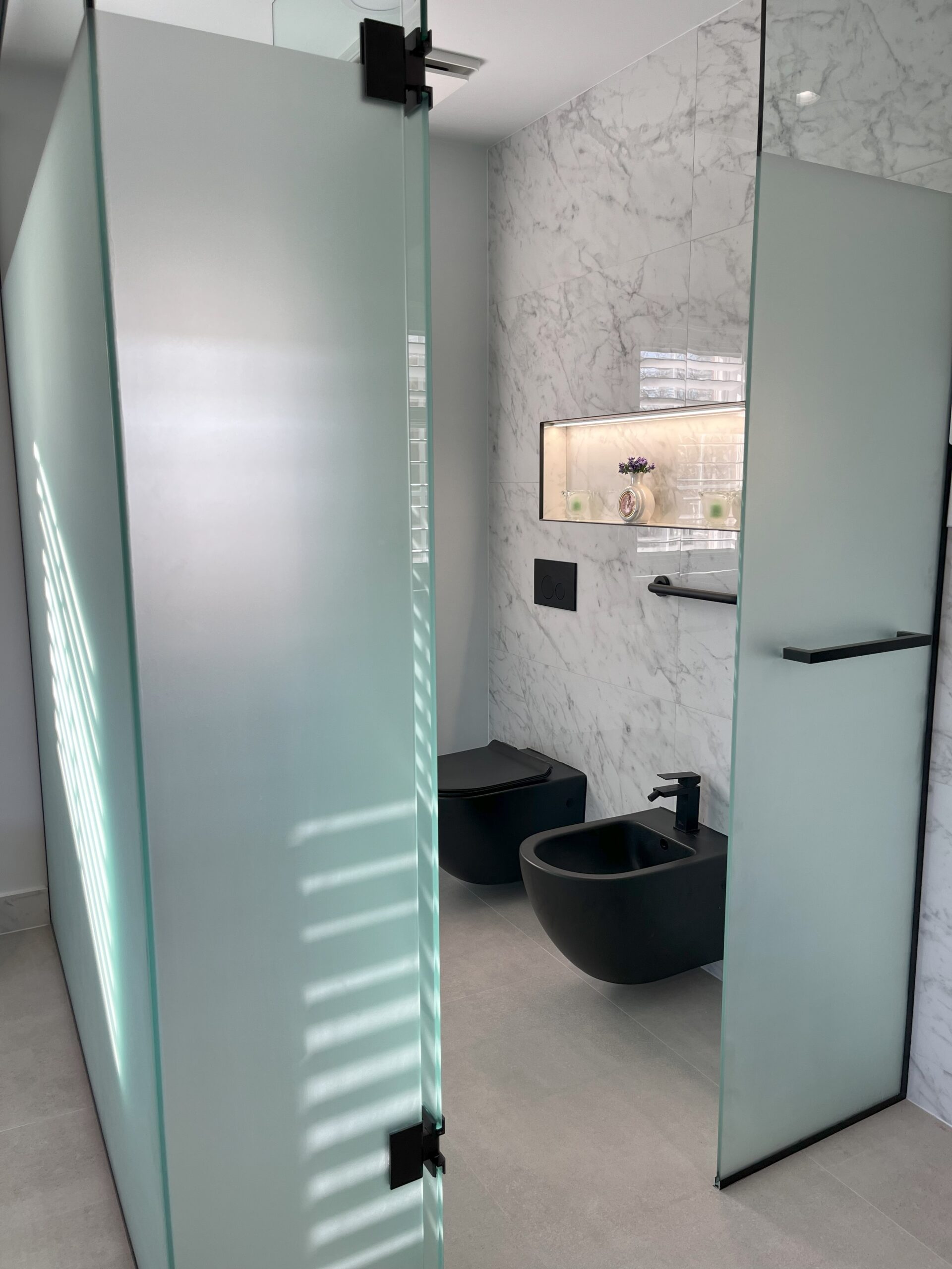 washroom renovation cost markham area black toilet&bidet with custom niche enclosed glass panels glass door