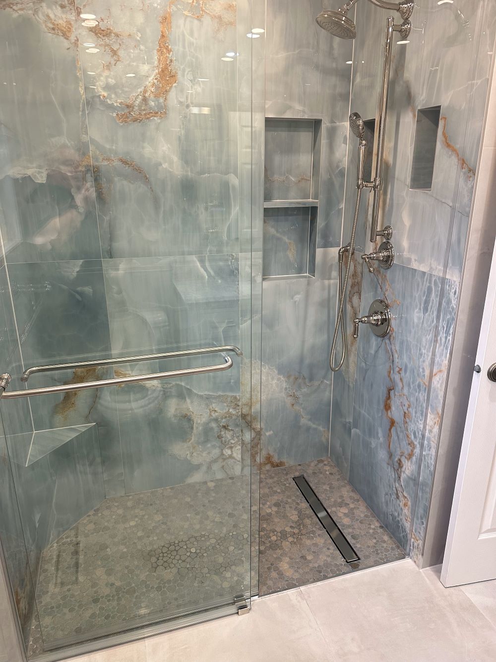 convert tub into shower. Shower Zone Includes two neat vertical built in niches and a corner benchseat, fully clad in the same onyxmarble look tile Barrie