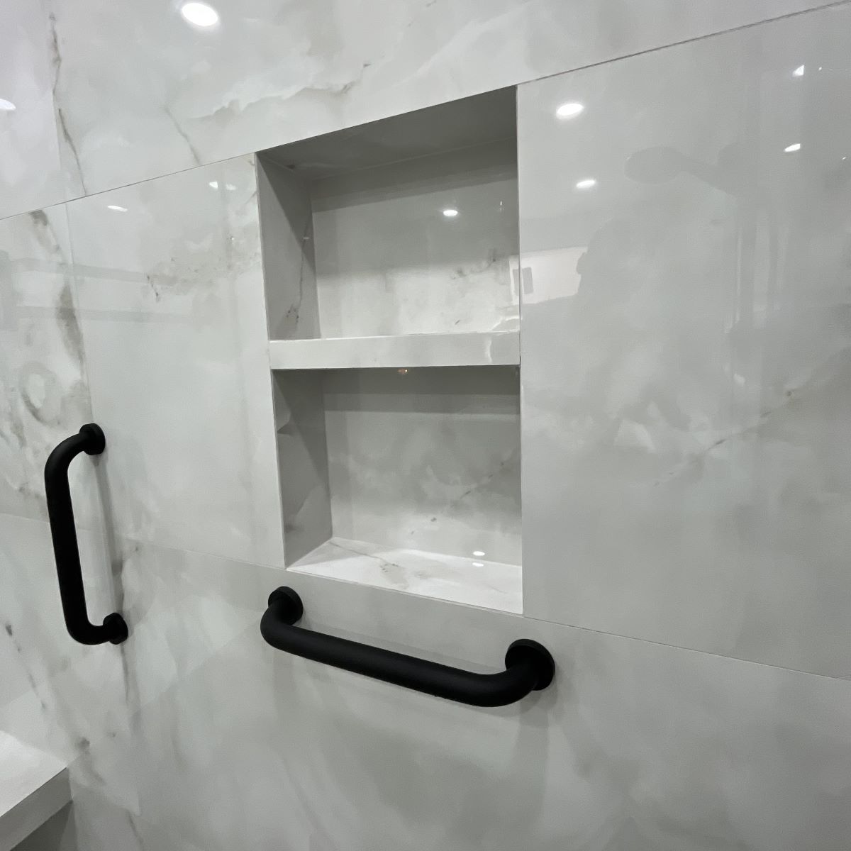 bathtub convert to shower, small bathroom renovation Glasses Curbless Walk In Showers with custom niches tiled recesses Grab Bars and Handrails for the seniors Barrie