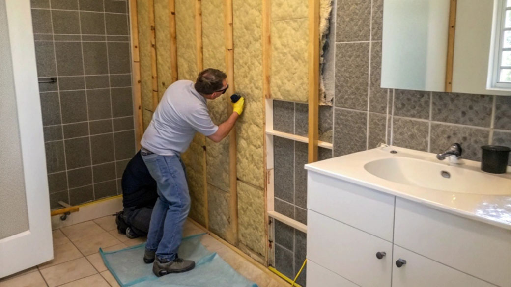 acoustic insulation being installed in a bathroom 2