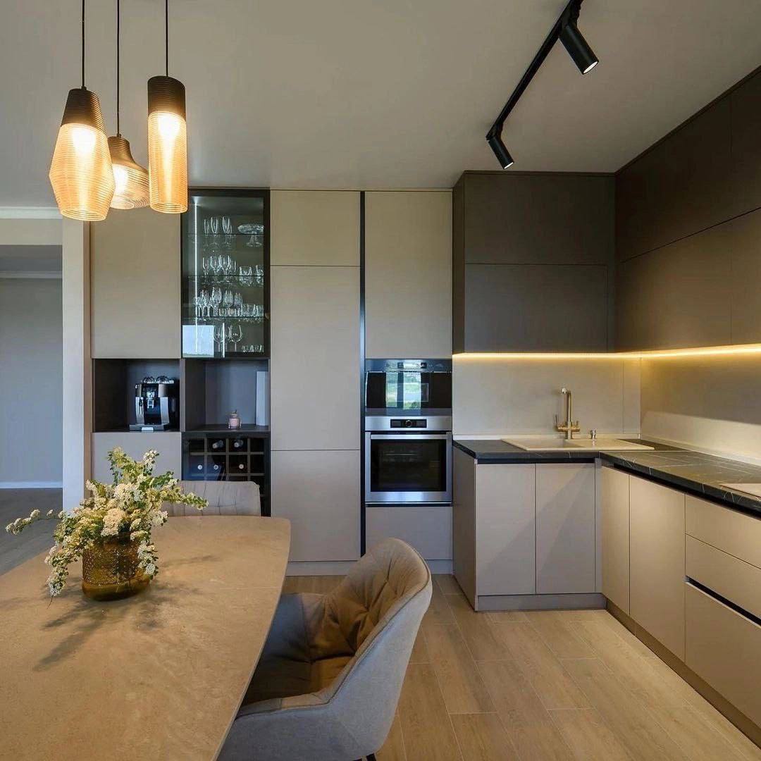 Corner view kitchen beige brown cabinets