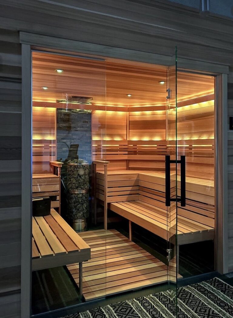 Glass front sauna installation in Toronto with Harvia cylinder heater and ventilation