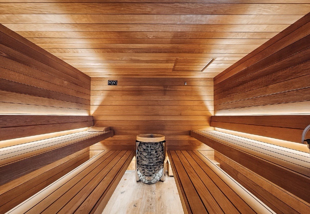 Sauna installation in Toronto with floating benches and hidden LED mood lighting