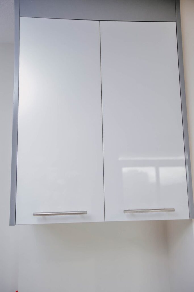 white gloss cabinet doors grey gable detail scarborough condo kitchen