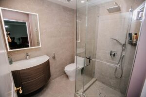 woodbine condo bathroom renovation floating vanity glass shower enclosure toronto