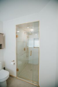 frameless glass shower enclosure gold hardware bolton ensuite 10