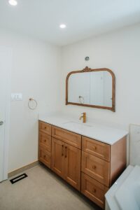 master bathroom renovation bolton vanity arched mirror gold faucet 06